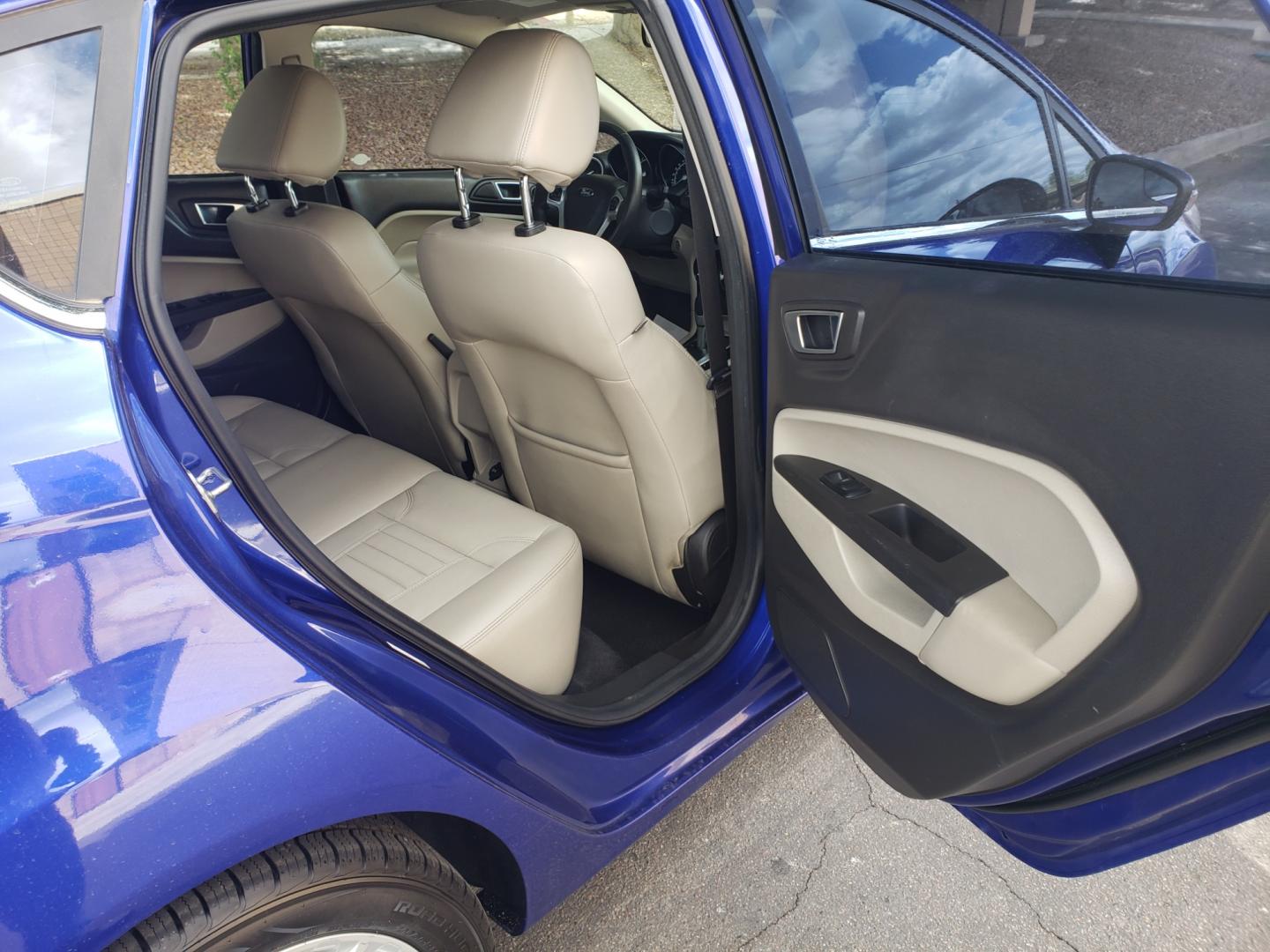 2014 /Tan and black Ford Fiesta Titanium (3FADP4FJ5EM) with an 1.6l i4 engine, 6-Speed Automatic transmission, located at 323 E Dunlap Ave., Phoenix, AZ, 85020, (602) 331-9000, 33.567677, -112.069000 - 2014 Ford Fiesta Titanium,.......A Must See!!... No accidents, Only 95K MILES.... Ice cold AC. The car is gorgeous inside and out. Power windows, Power door locks, Touch screen Stereo/ CD Player, Phone sync, Bluetooth, Satellite compatible, Backup camera, Beautiful tan and black interior with tan le - Photo#14